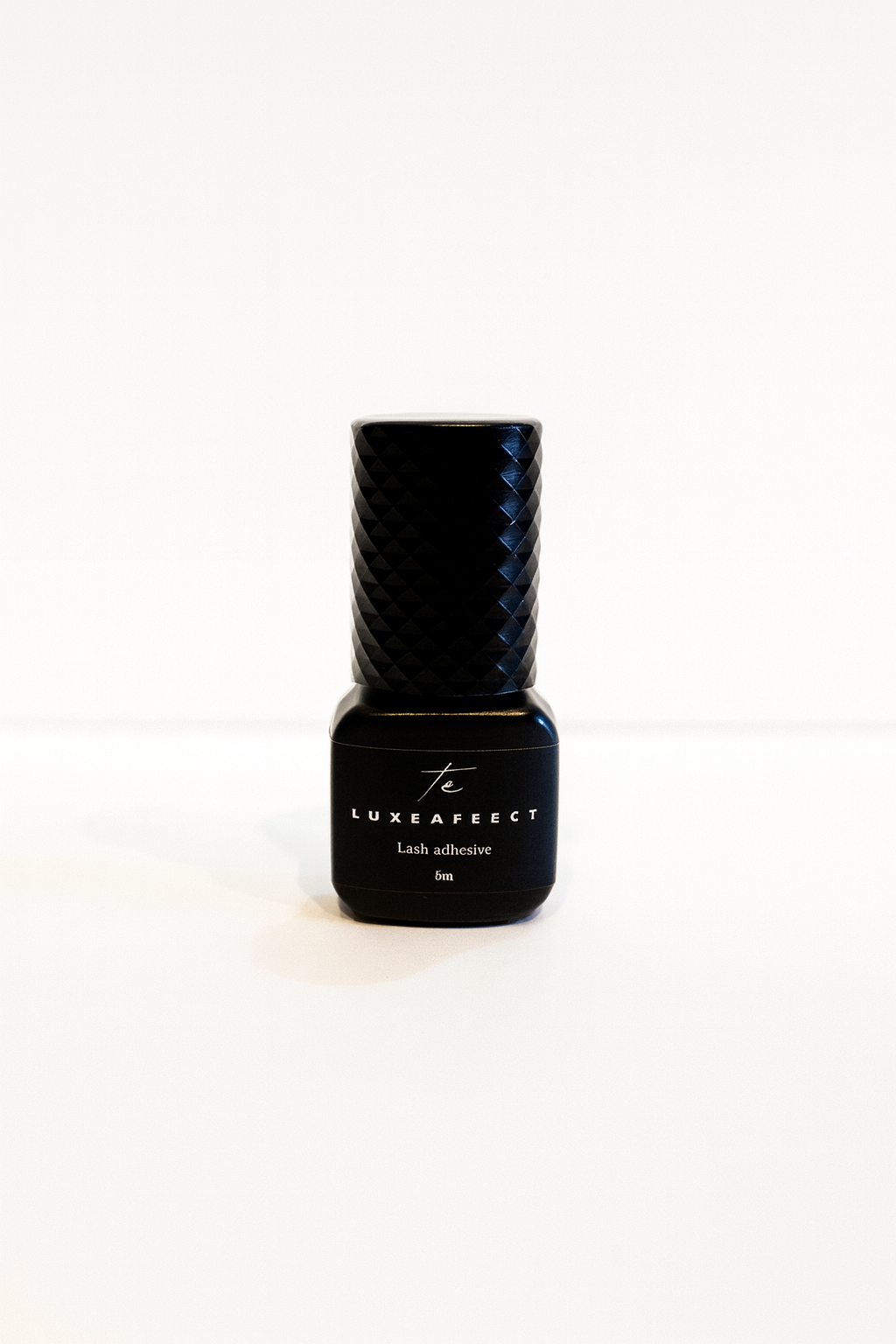 LASH ADHESIVE